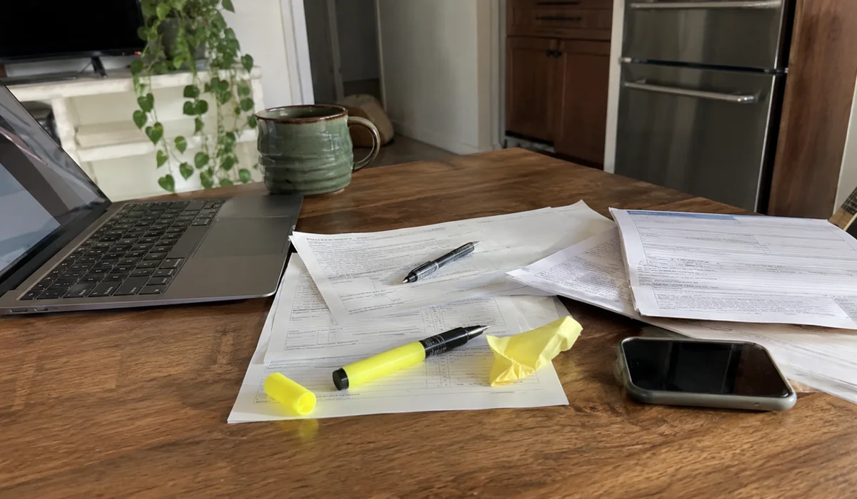 Fort Worth Second Chance Team housing voucher paperwork and tenancy approval form on a kitchen table